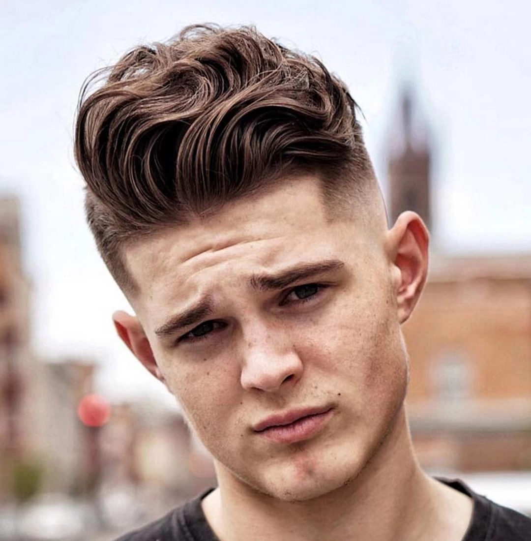 Men's Fade Haircut with Long Top and Short Sides from Fifth Ave Barber Shop in Midtown NYC