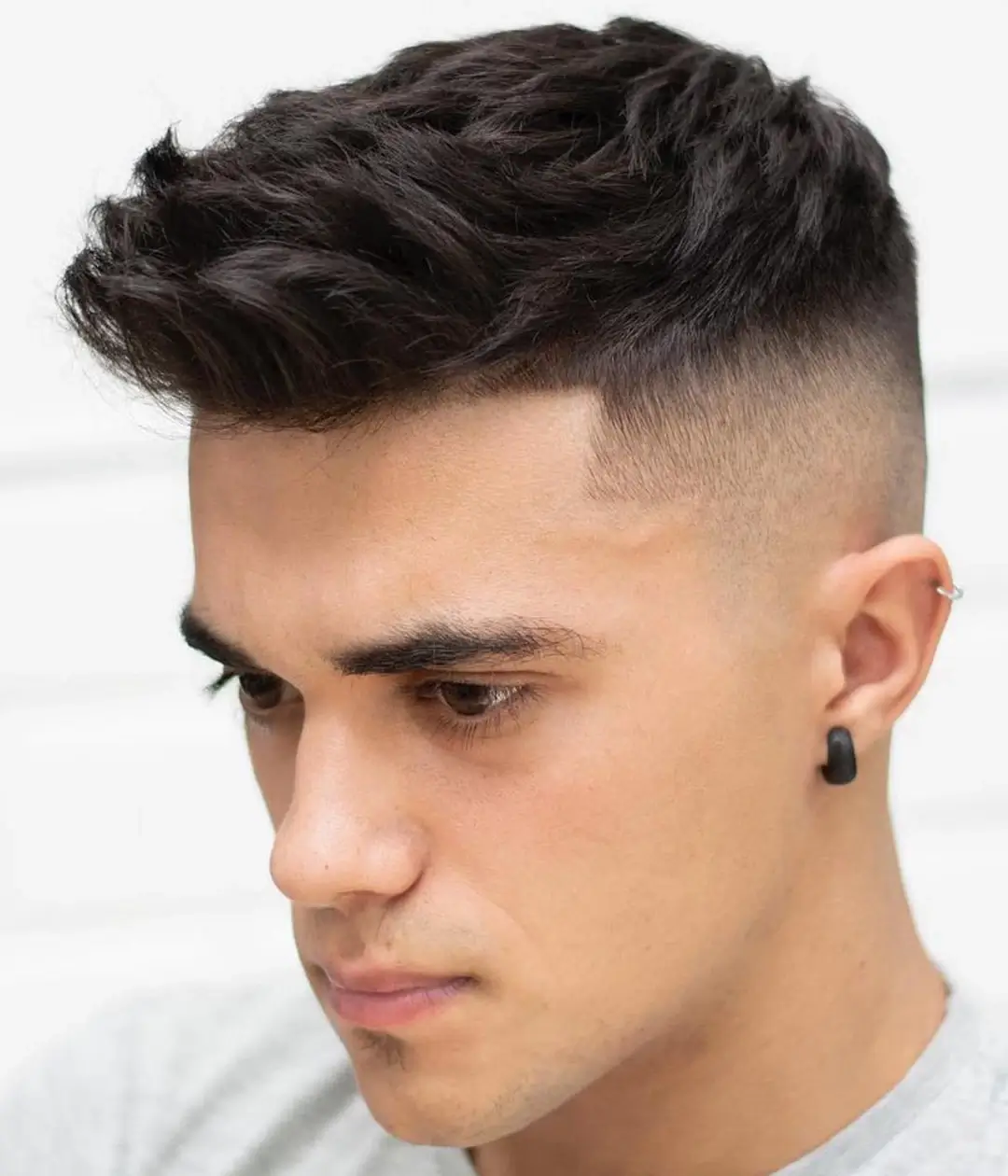 Men's Fade Haircut with Textured Top from Fifth Ave Barber Shop in Midtown NYC