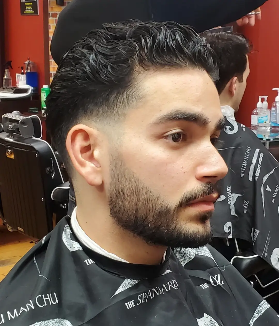 Men's Low Skin Fade Haircut by Fifth Ave Barber Shop in Midtown NYC